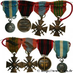 TROISIÈME RÉPUBLIQUE Barrette artisanale de 4 médailles militaires